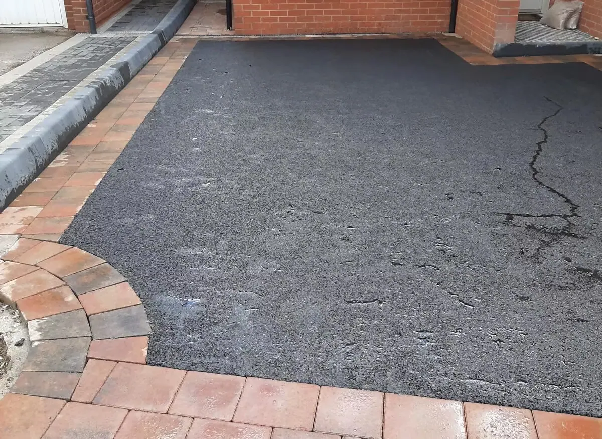 Tarmac repairs outside a house