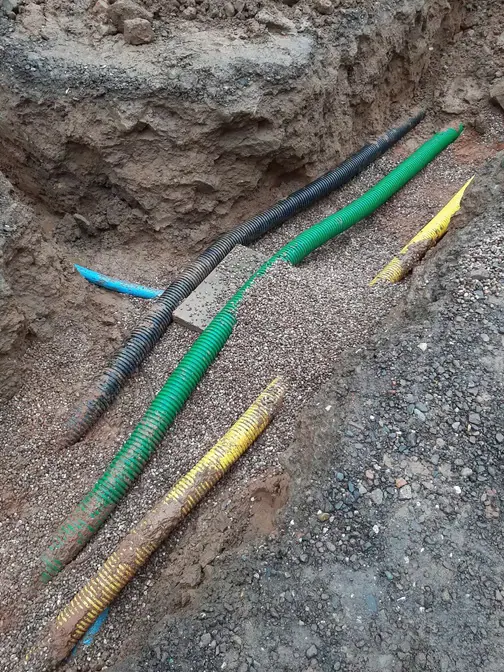 Ducting laid in an excavated trench