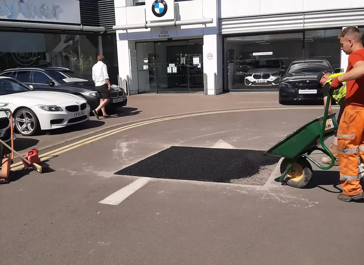 Pothole repairs at a dealership