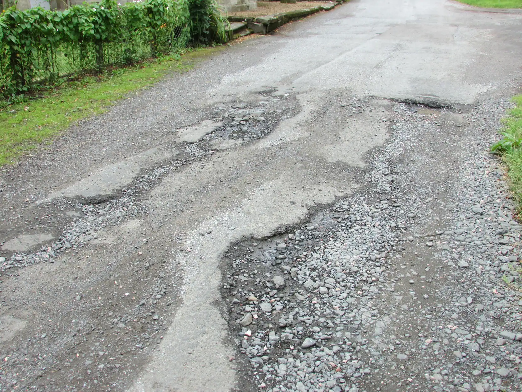 Damaged Roads by SN Enterprises Ltd